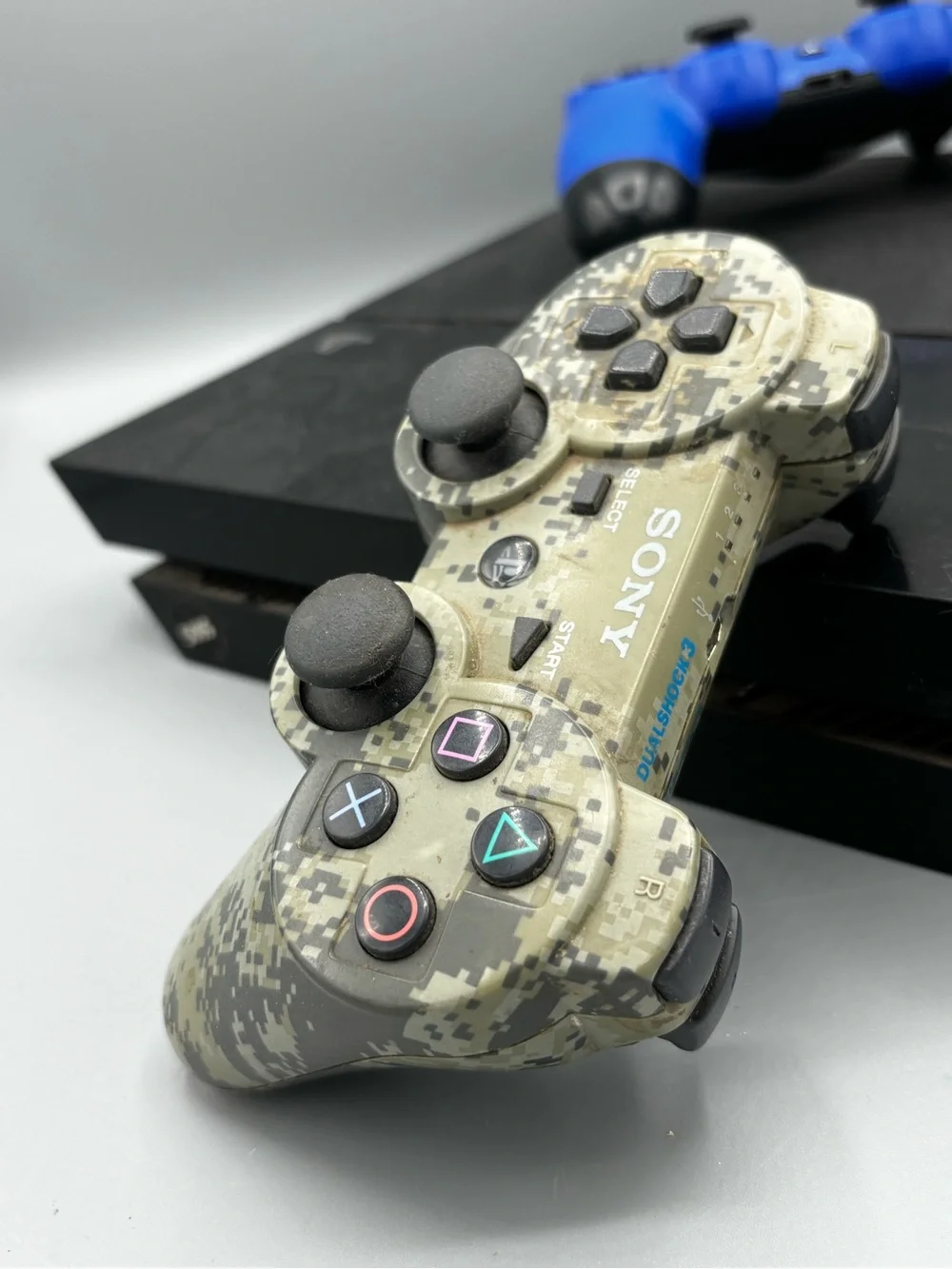 Sony PS4 Slim with Blue and Camouflage DualShock Controllers